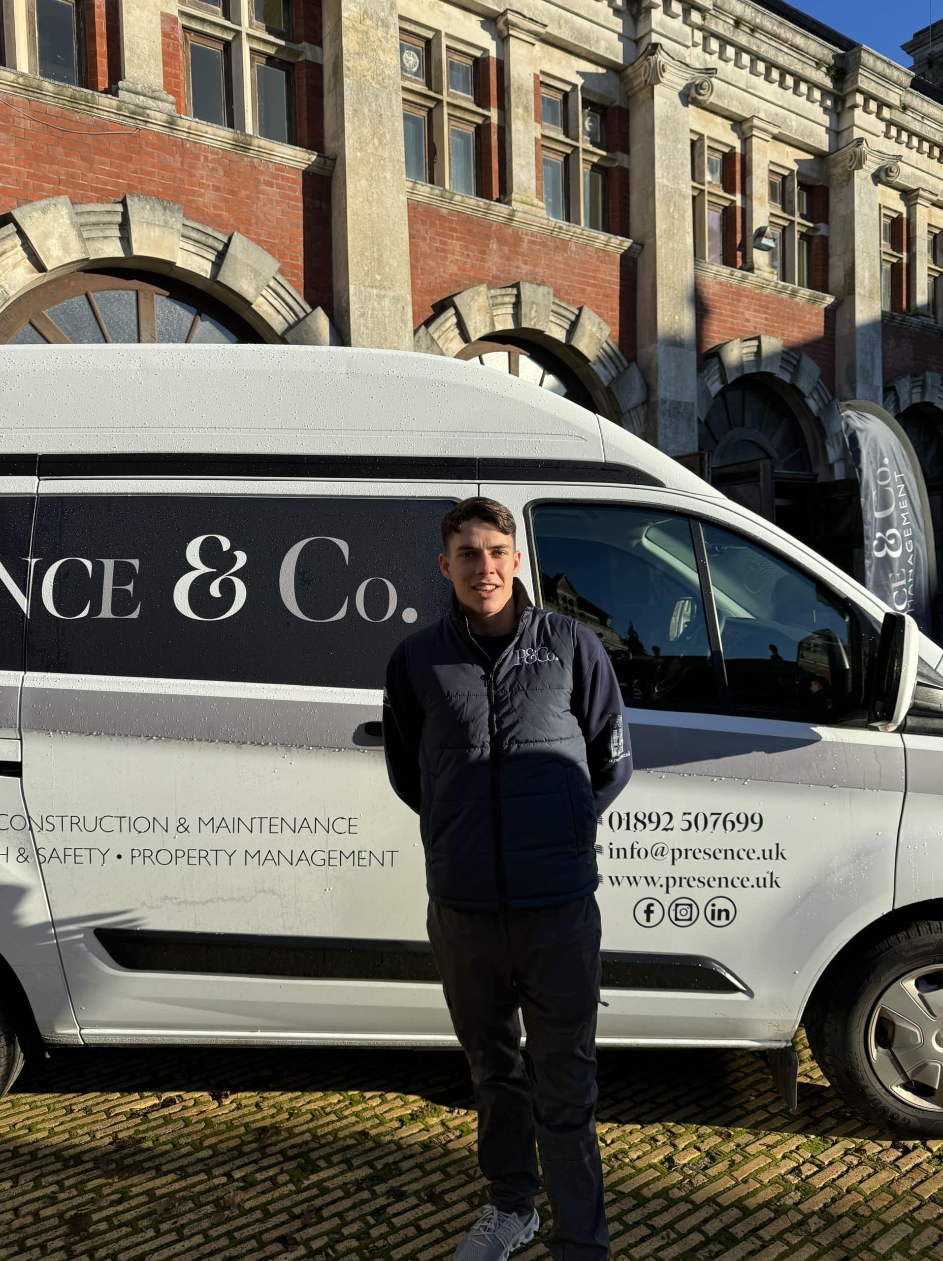 Monty, Presence & Co. apprentice outside by braanded vans